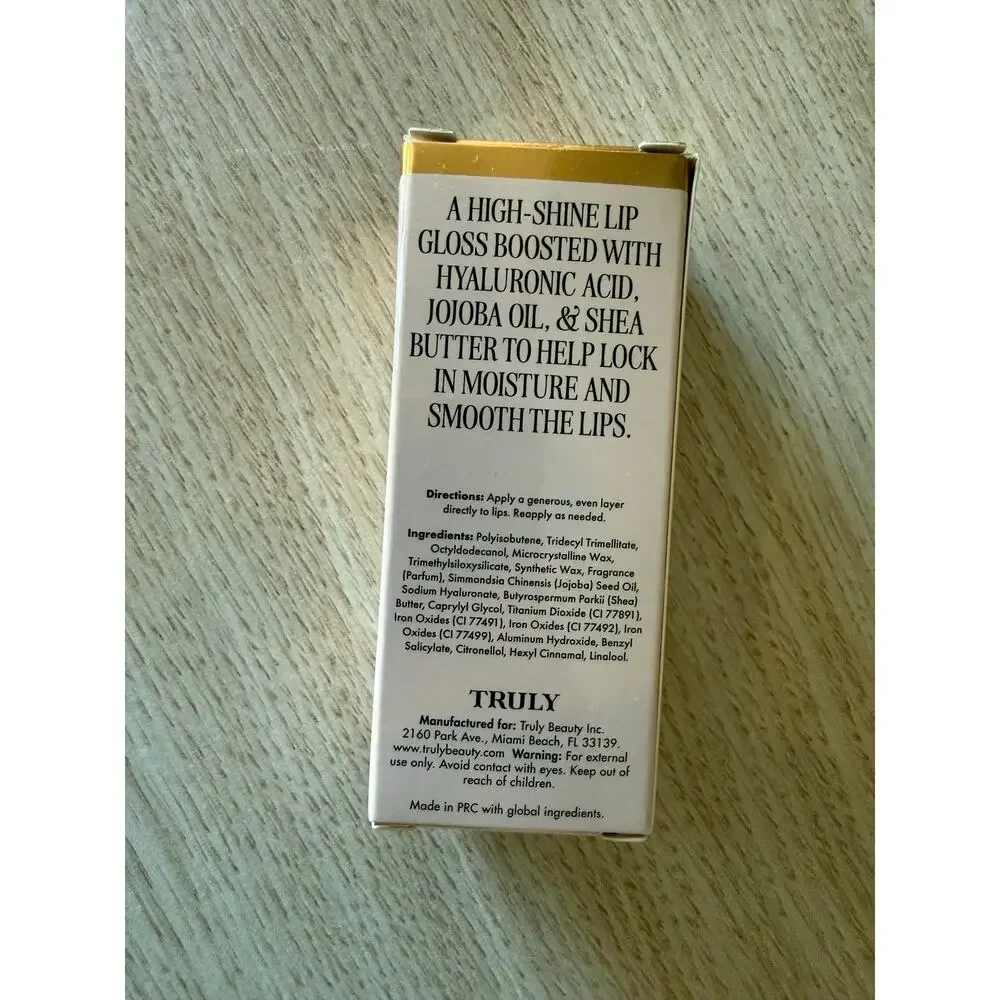 $29 New Truly Hydrating Lip Gloss - Vanilla Baby